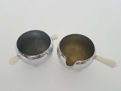 Chrome milk jug and sugar pot with bakelite handles - bid per each to take both