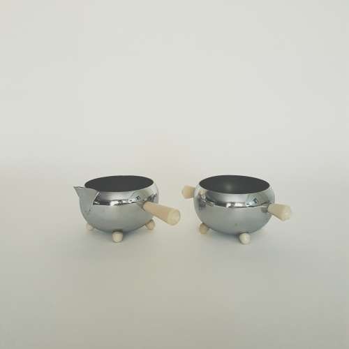 Chrome milk jug and sugar pot with bakelite handles - bid per each to take both