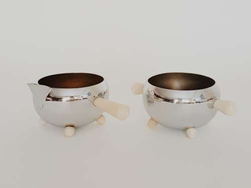 Chrome milk jug and sugar pot with bakelite handles - bid per each to take both