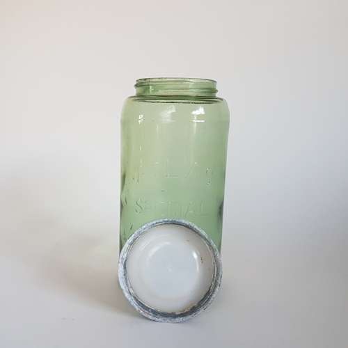 Large vintage Atlas jar in green colour with original zinc lid