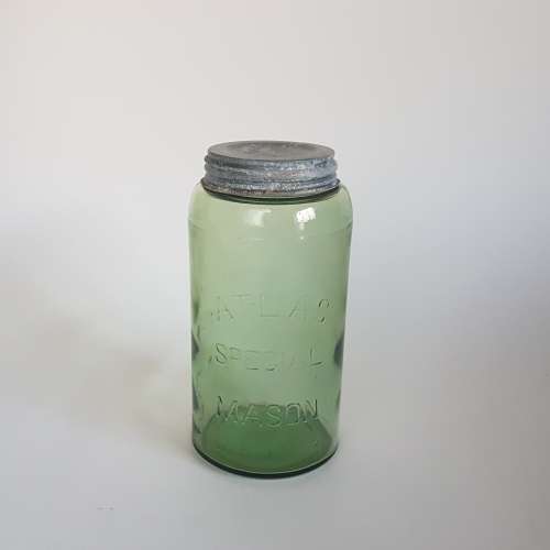 Large vintage Atlas jar in green colour with original zinc lid