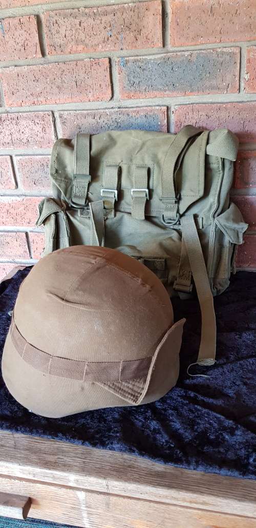 ARMY RUCKSACK AND HELMET- HIGHEST BID TAKES BOTH