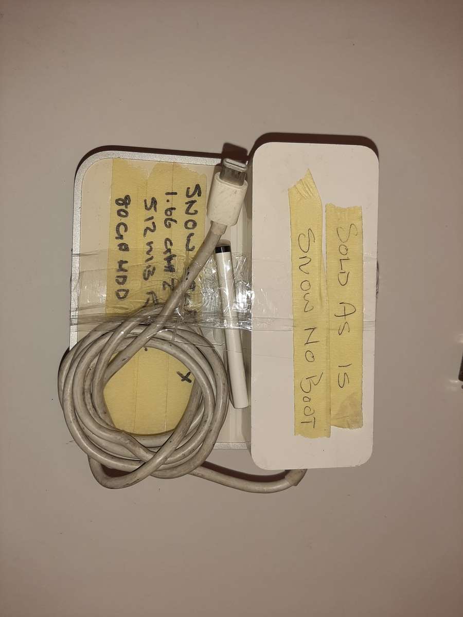 Apple Mac mini 1..6hz, 512mb Ram, 80gb HDD with power supply, and remote ( Snow Leopard )