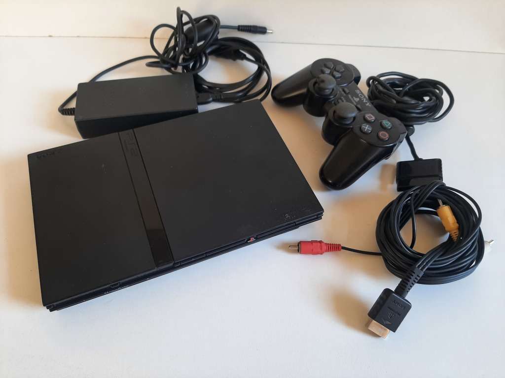 PS2 Slim Powers up but not reading disk