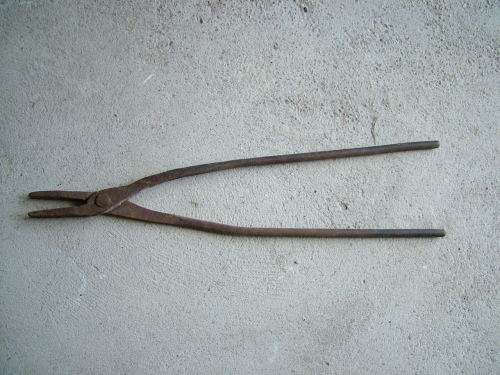 Antique hand made blacksmithing tongs