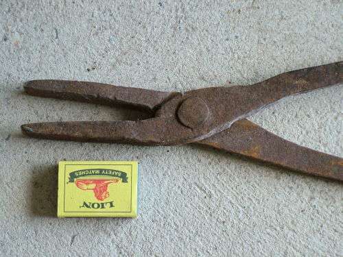 Antique hand made blacksmithing tongs