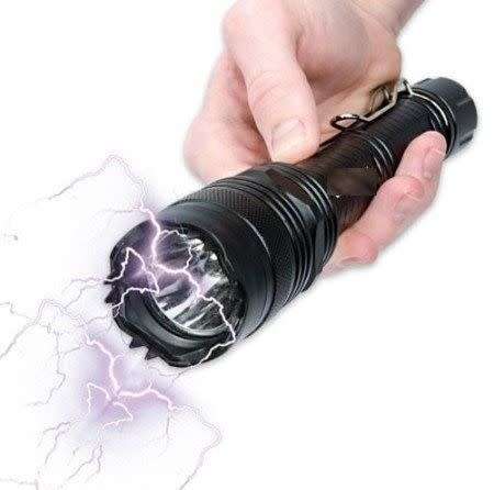 Shocking stick with flashlight with belt bag and charging cable