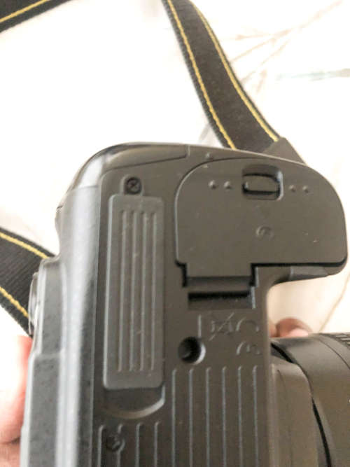 Nikon D7000 with 55-200mm lens (Pro digital camera)