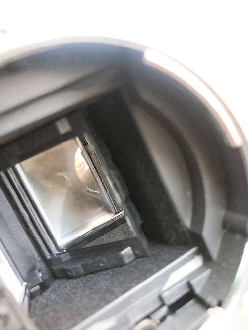 Nikon D7000 with 55-200mm lens (Pro digital camera)