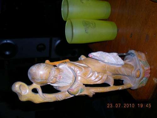 Wooden Man and Stork