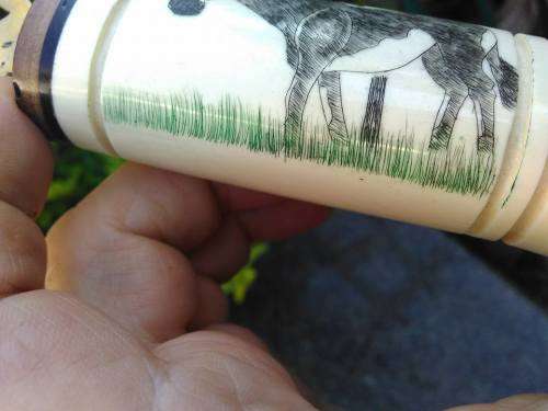 VINTAGE BRASS, BONE AND WOOD BOTTLE OPENER WITH SCRIMSHAW (?) ARTWORK