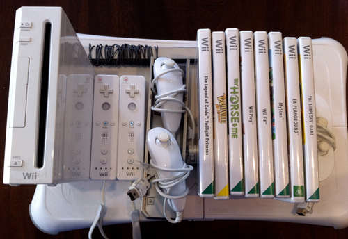 Nintendo Wii + WiiFit bundle (with 8 games, 5 controllers, 8GB SD card)