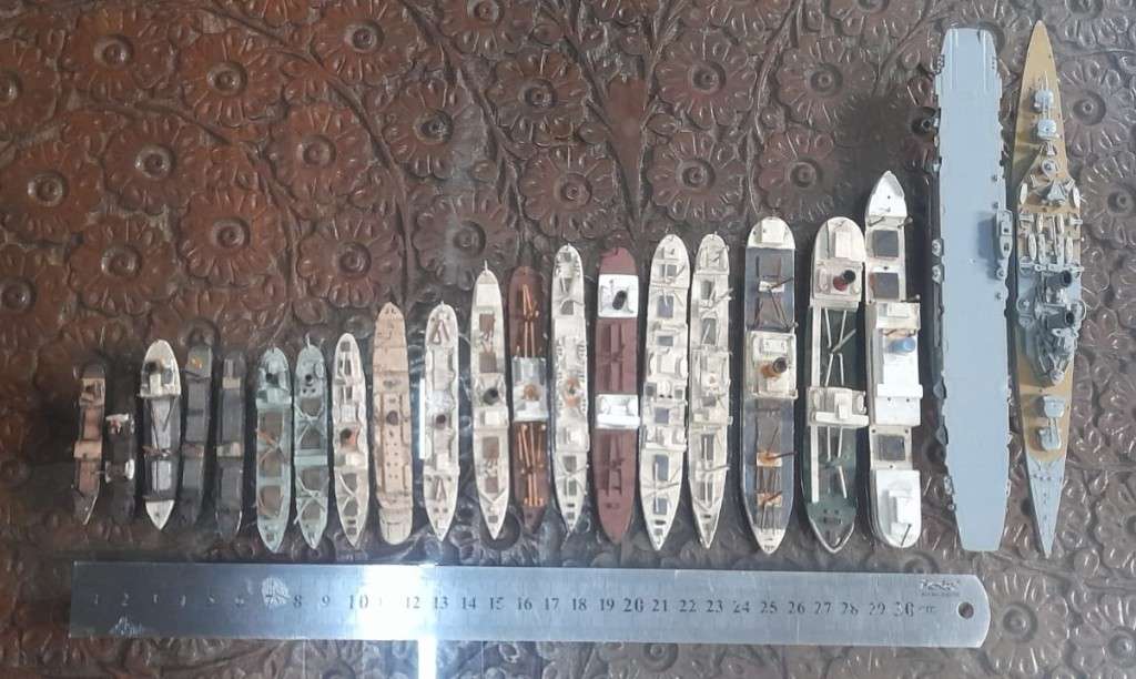Hand carved 21pc wooden ships. See photos.
