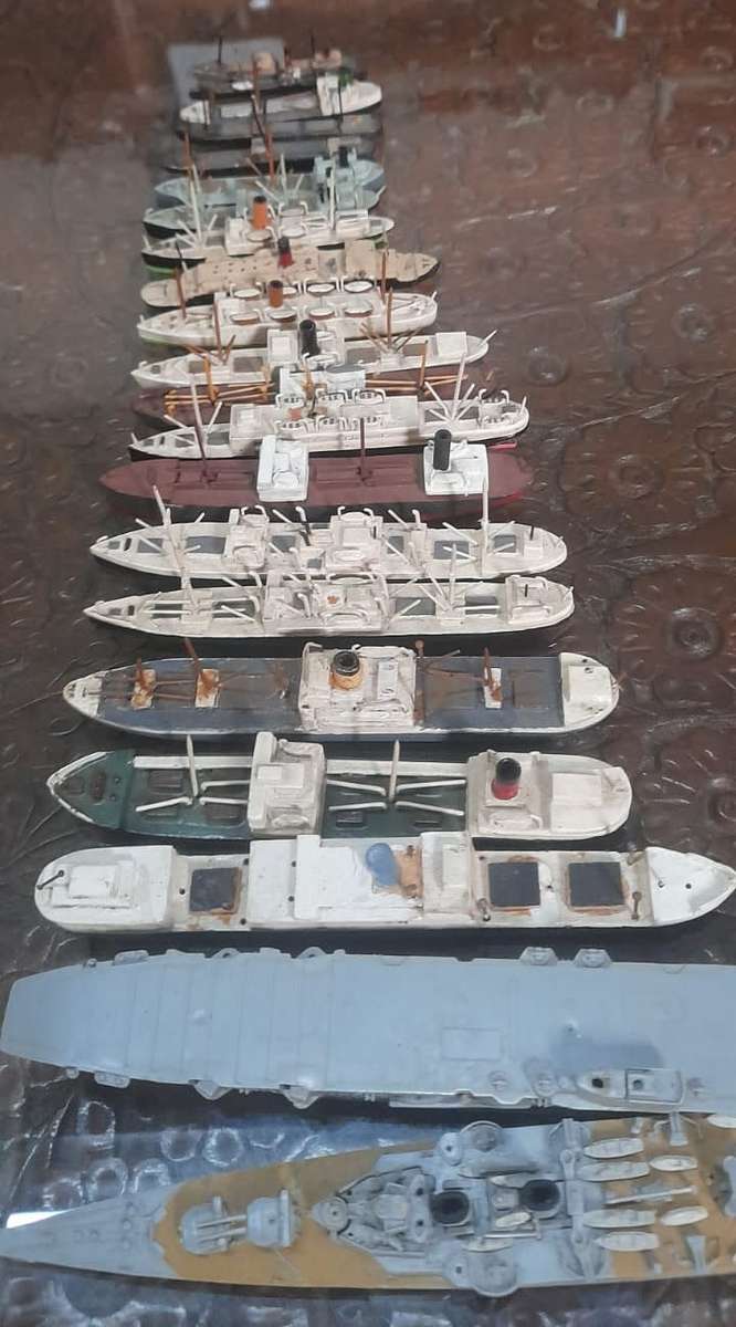 Hand carved 21pc wooden ships. See photos.