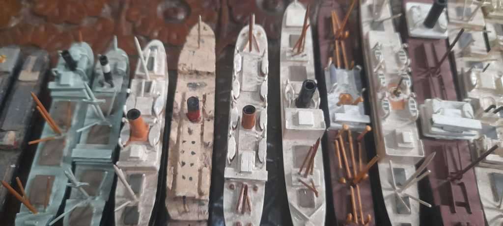Hand carved 21pc wooden ships. See photos.