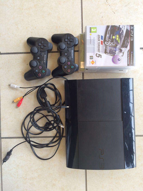 Playstation 3 bundle - 500GB slim PS3 console, 4xGames, 2xControllers & Cables.