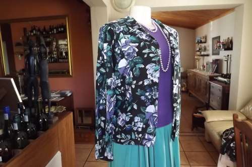 Black viscose button down top with dark purple/blue roses.Size 38/14