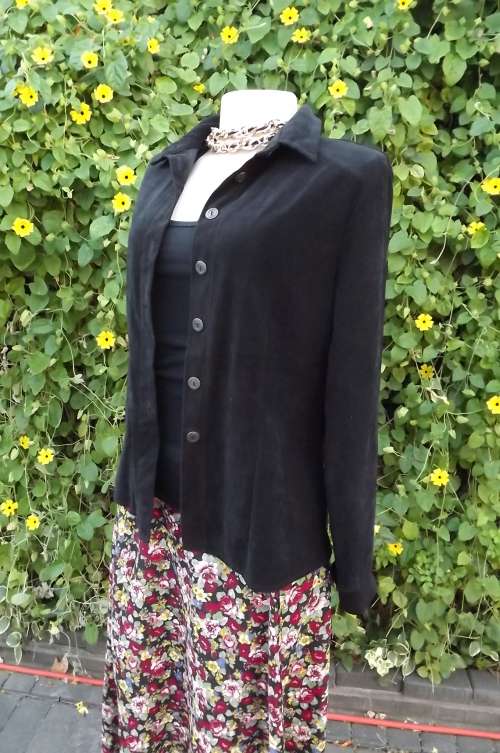 Black brush polyester jacket/top by Moondrops.Size 34/10.Long cuffed sleeves. Must have for winter!