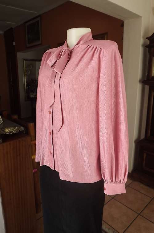 Coral pink vintage long sleeve polyester/nylon blouse size 42/18.Back yoke banded collar with tie