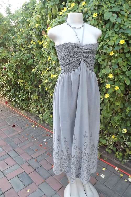 Silver grey sheer polyester dress with black floral border.Size 34/10 by Pop Show.