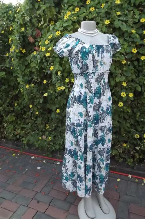 White Feminine ankle length dress with blue flower and paisley pattern.Size 36/12 by New Feeling