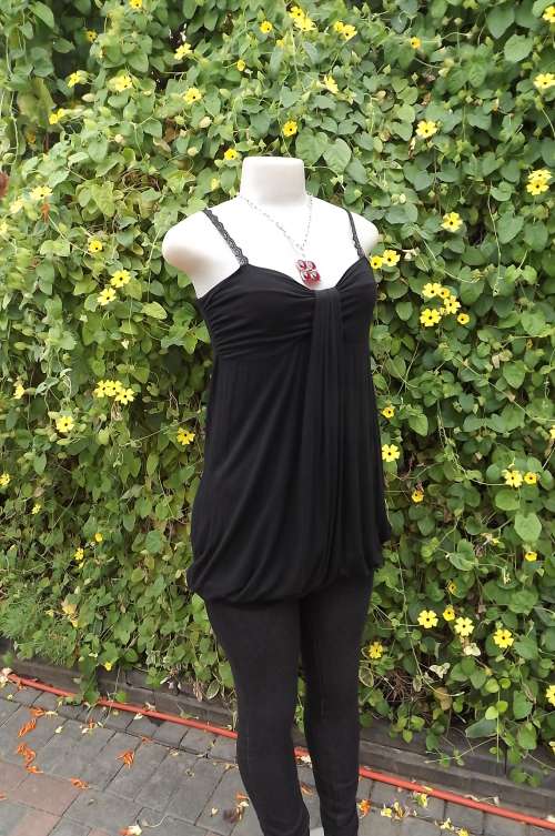 Long black viscose stretch blouson style top size 34/10. Strappy shoulders with gathered bust