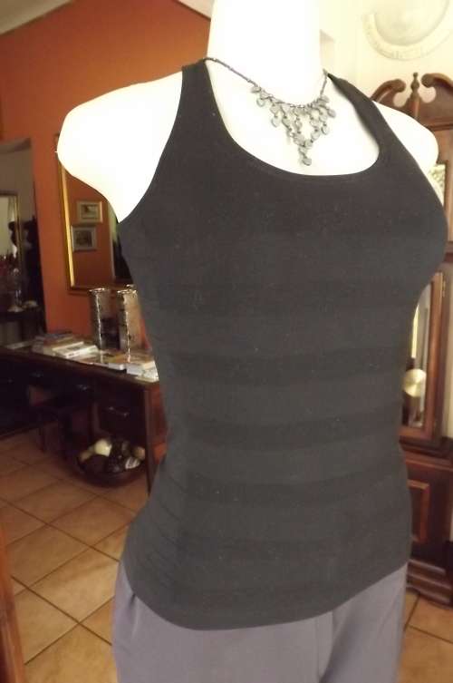 Black nylon stretch top with horizontal stripe texture size 32/8.Build in bra.Good condition