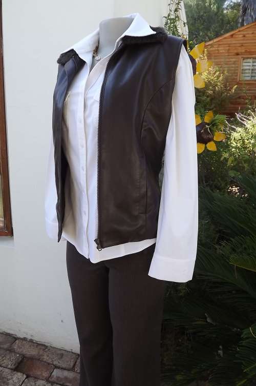 Chock brown InWear International waistcoat in PVC outer.Size 32/8.Knitted backing