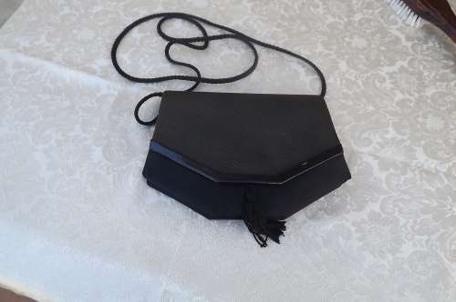 Beautiful shaped evening bag in black satin and green/black.With tussel and cord sling.