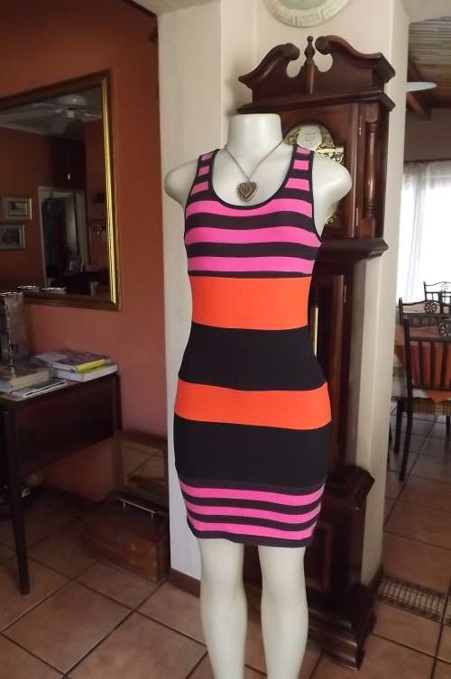 Sexy Identity body con dress in orange,pink + black colour stripes.Size 34/10