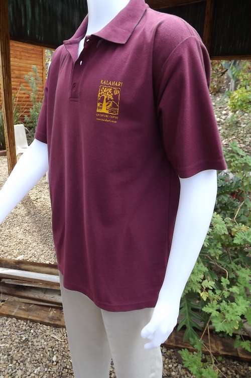 Maroon logo golf shirt by Kalahari Adventure Centre.Size L good condition