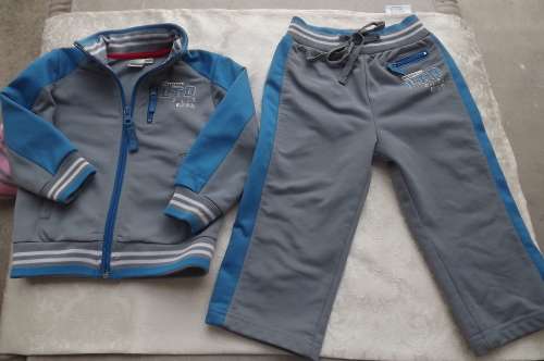 Matching grey pants and zip up jacket for boy of 18 to 24 months from LTD.Blue trimming. Good cond.