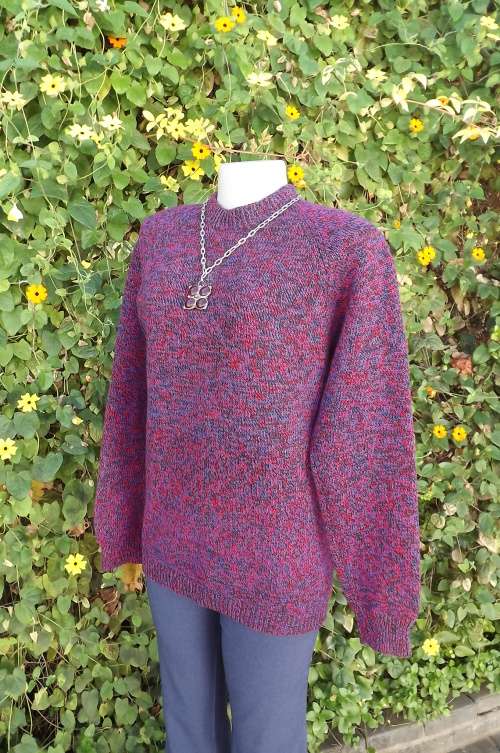 Hand knitted ladies jumper in red and blue tones. With crew neck.Size 38/14. As new.