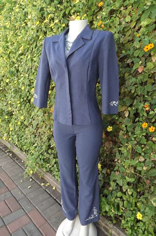 Smart denim blue 2 piece pant suit by W W W in size 32/8. Embroidered. As new.