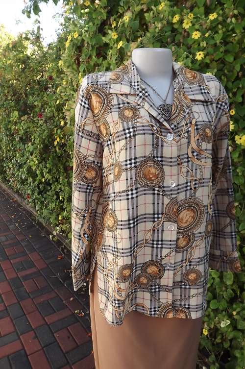 Beautiful autumn colour blouse in check with cables and pink touches.Size 38/14.As new.