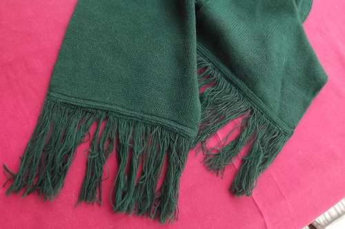 Men's dark green knitted scarf. Plain and smart. Can wear casual or with your suit. 150cm long.