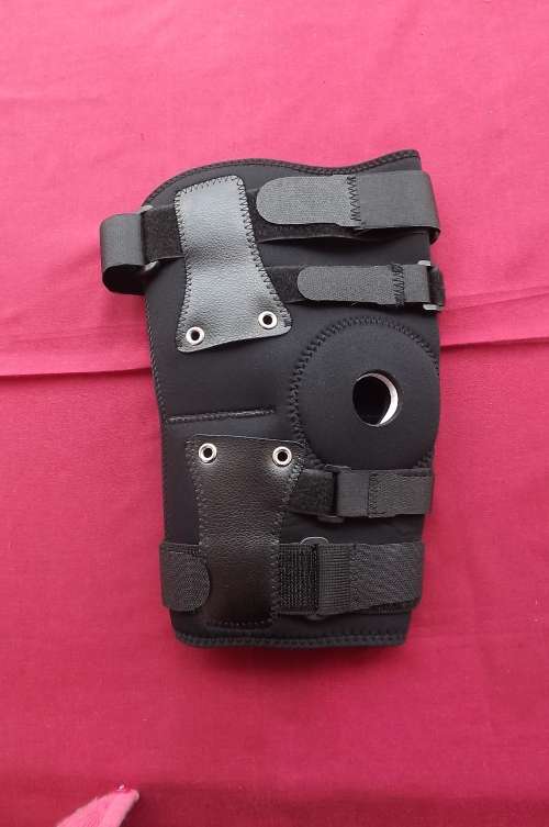 Knee brace by Orthofit in size medium with straps to adjust. Used once. Length 30.5cm