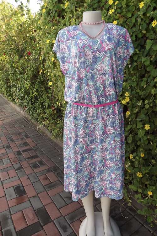 Vintage Nuvelle dress by Rosecraft in size 44/20.Blue,green,and pink graphic print.Belt included