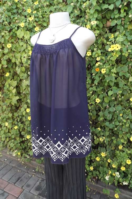 Pretty sheer dark purple strappy top elasticated over bustline. Size 36/12.As new