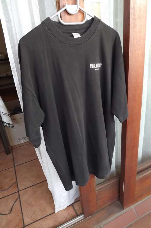 Black T shirt in 100% cotton Size L.Used a lot.In good condition but black a bit faded