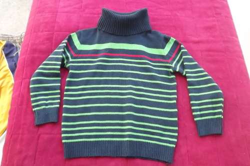Pretty navy poloneck acrylic knit jersey.Size for 2 to 3 yer old boy.With green and red stripes.