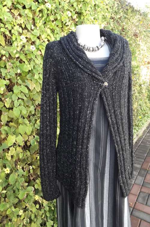 Black with silver thread knitted cardigan in ribbed pattern.Size 34/10 best fit.Open hanging