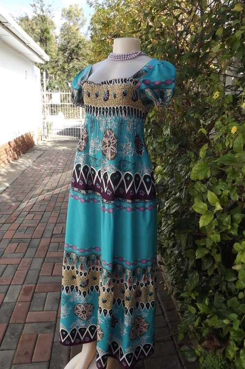 Summer maxi dress with elasticated top by Cool Ice.Size 36/12.Used but still in good condition