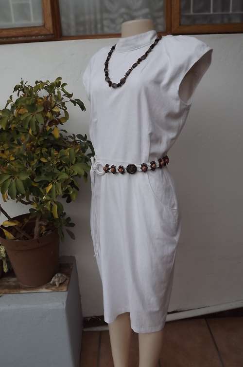 White cotton/linen vintage dress with very sexy button down back.Size 36/12 by Wild Rose.As new