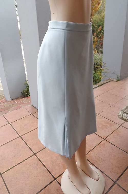 Powder blue classic vintage skirt from 80's by "Princess" in size 42/18.In amazing as new condition