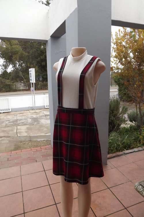Cute red tartan check dress with white top.Size 36/12 by Fashion Express.In 100% stretch polyester.