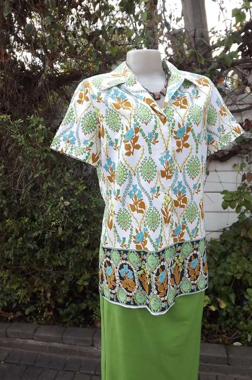 White bohemian print top from the 80's.Green,blue,light brown and black patterns.Size 38/14