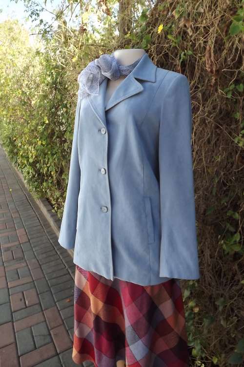 Styled light steelblue lined jacket.Size 34/10 by Woolworths. In soft polyester fabric.As new