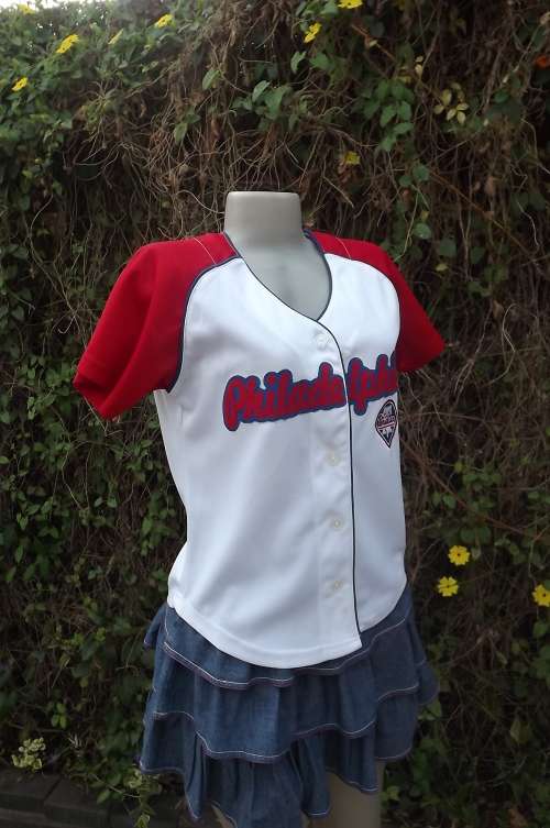 Sporty Phillies white and red button down top by "Lady Slugger" in size 32/8.Loose fit.As new
