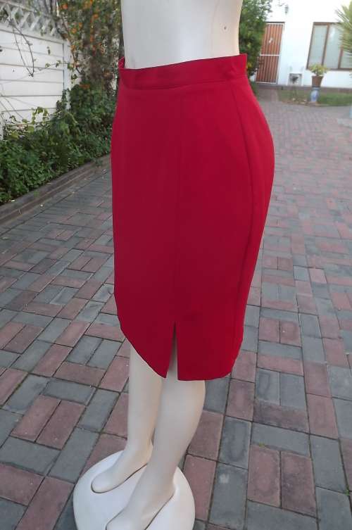 "Must have" cherry red knee length pencil skirt fully lined by Truworths size 36/12.New condition